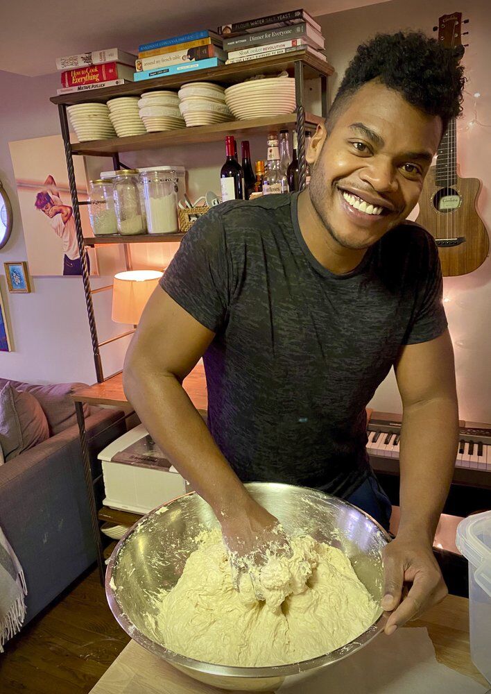 Kumangai making bread